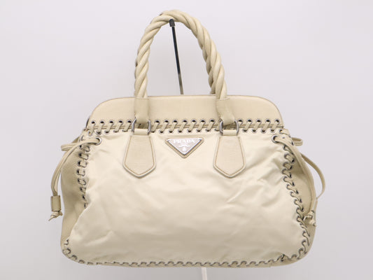 PRADA Nylon/Leather Triangle Logo Handbag in Beige and White with Silver Hardware
