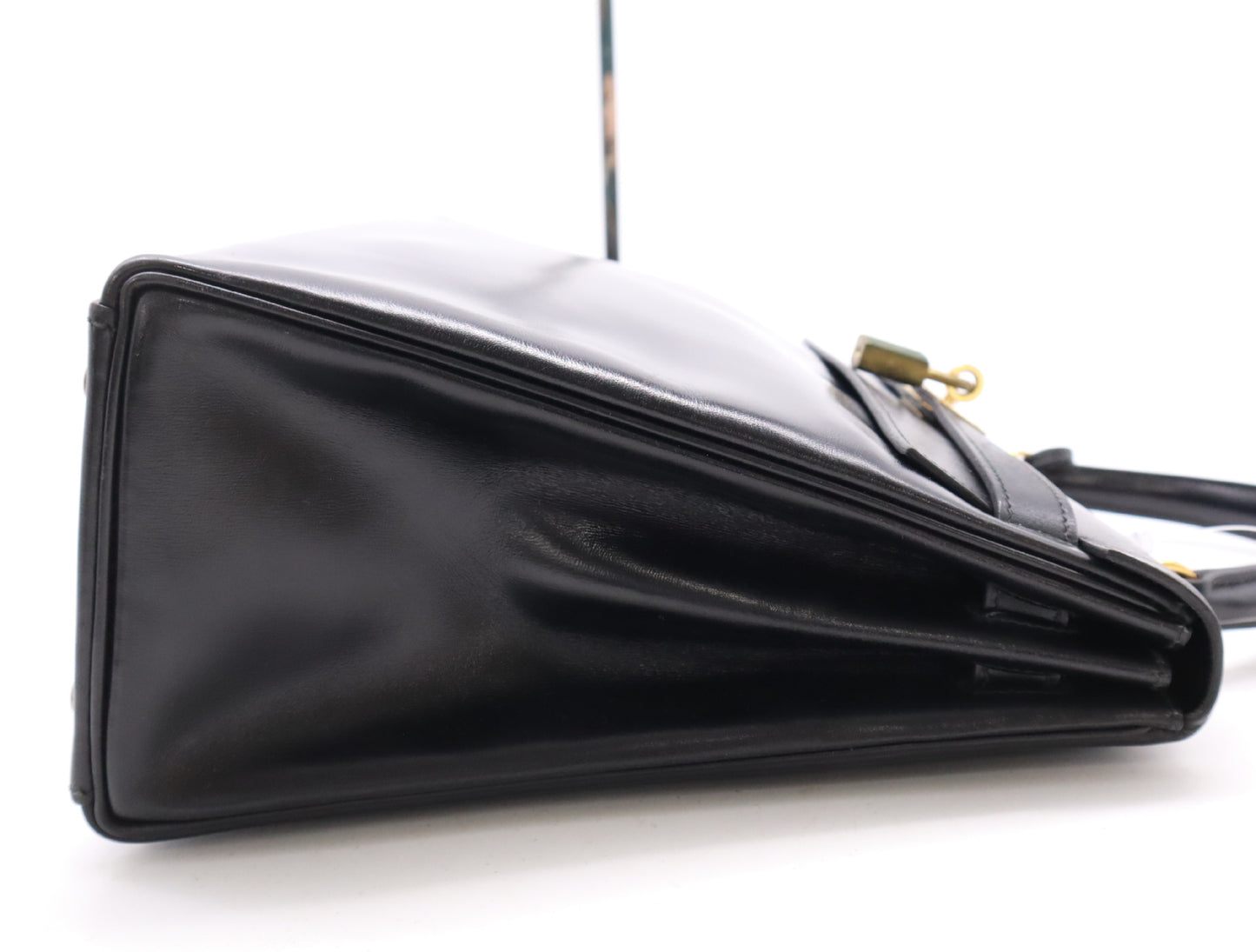 HERMES Box Calf Kelly 32 Black with GD hardware, padlock, two keys, cloche, dust bag, and box. 〇N stamped. 1984.