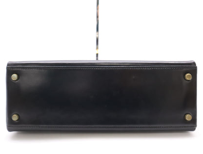 HERMES Box Calf Kelly 32 Black with GD hardware, padlock, two keys, cloche, dust bag, and box. 〇N stamped. 1984.