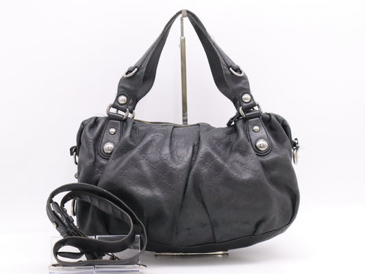 GUCCI Leather Guccissima 2-way Handbag in Black with Silver Hardware and Shoulder Strap