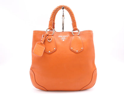 PRADA Leather Orange Handbag with Silver Hardware and Name Tag