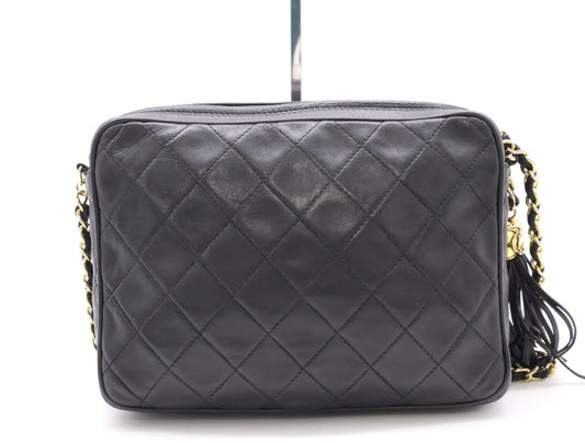 CHANEL Lambskin Matelasse 22 Shoulder Bag with Fringe, Tassel, and GD Hardware, Black Seal, 1563828