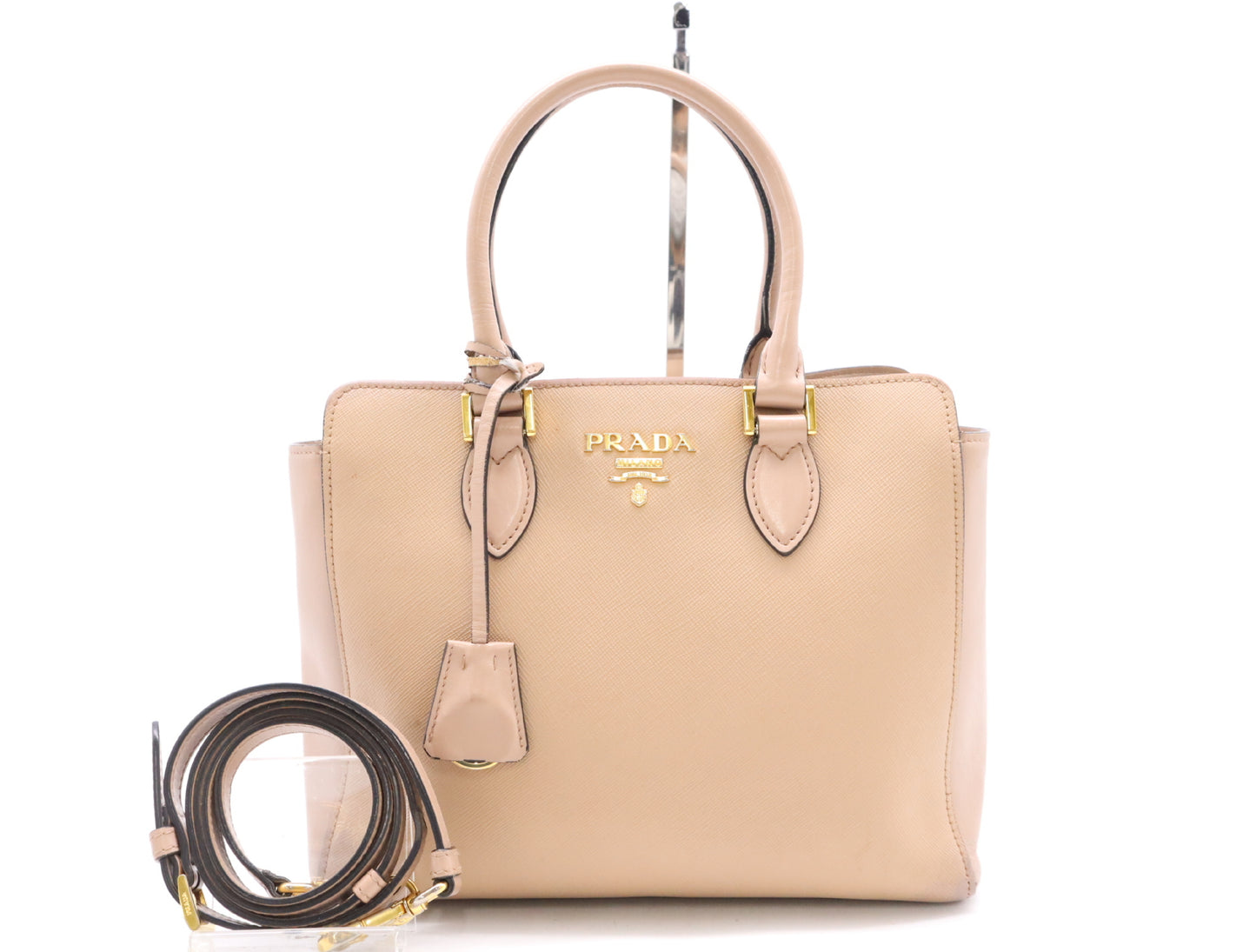 PRADA 2-way leather handbag in pink with GD hardware, shoulder strap, and clochette.
