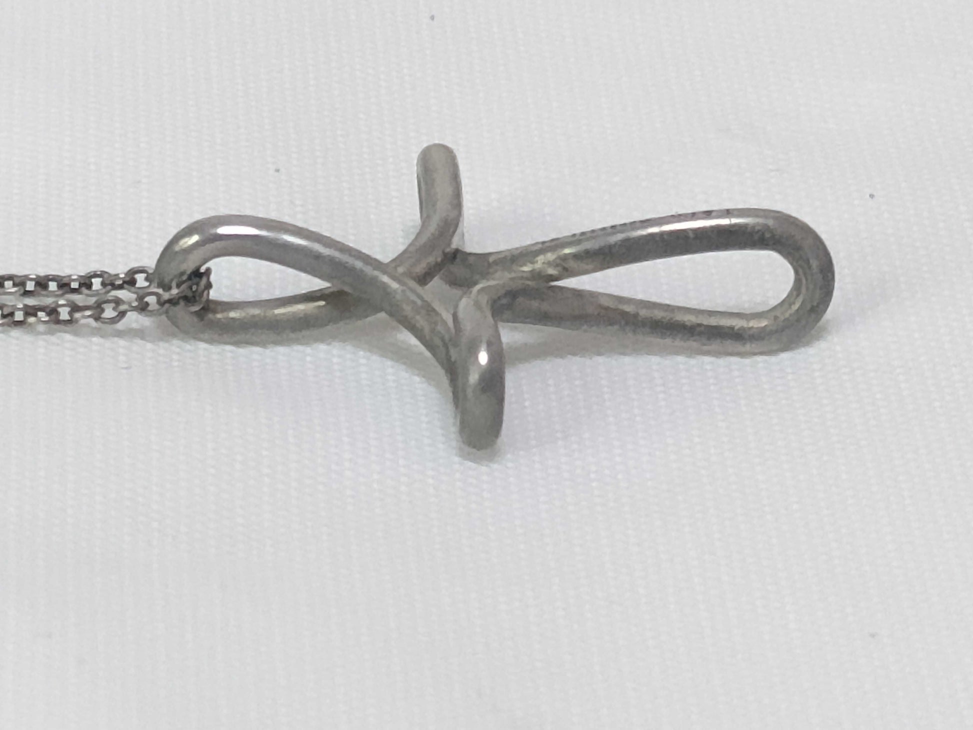 Tiffany & Co. Tiffany 925 Infinity Cross Necklace Necklace