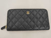 CHANEL Matelasse Caviar Leather Round Zip Wallet in Black with Gold Hardware, 22666637, Card/Stickers