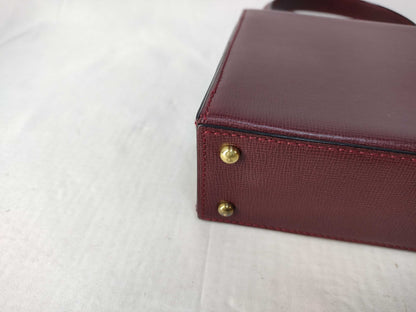 Cartier Bordeaux Turnlock Handbag