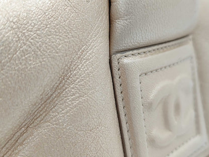 CHANEL Coco Cocoon Hand Leather Gold Handbag