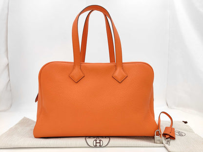 HERMES Victoria 35 Orange Taurillon Sterling Silver Hardware T Stamp Handbag