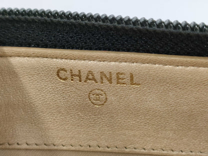 CHANEL Lambskin Camellia Round Zip Wallet