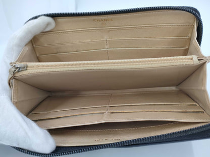 CHANEL Lambskin Camellia Round Zip Wallet