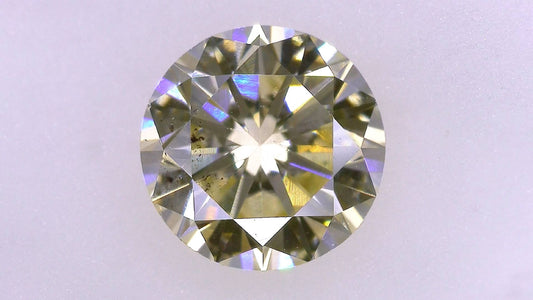 1.183ct Under S) Light Brownish Yellow SI-2 Good/Grade/Grade Strong Blue Natural 6.69-6.75 x 4.14mm Diamond Loose