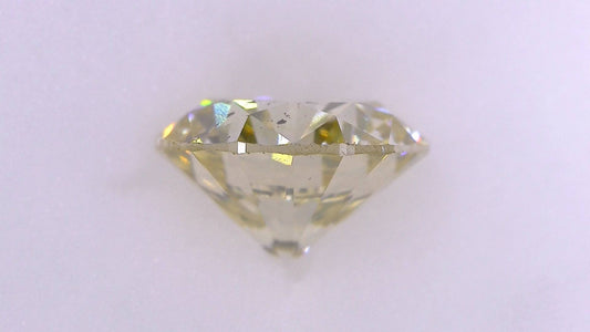 1.183ct Under S) Light Brownish Yellow SI-2 Good/Grade/Grade Strong Blue Natural 6.69-6.75 x 4.14mm Diamond Loose
