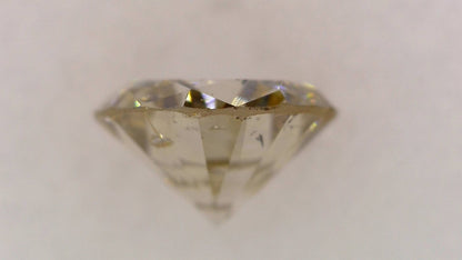 0.708ct UNDER S) LIGHT BROWN SI-2 GOOD/FR/FR MEDIUM BLUE NATURAL 5.76-5.85X3.40mm Loose Diamond