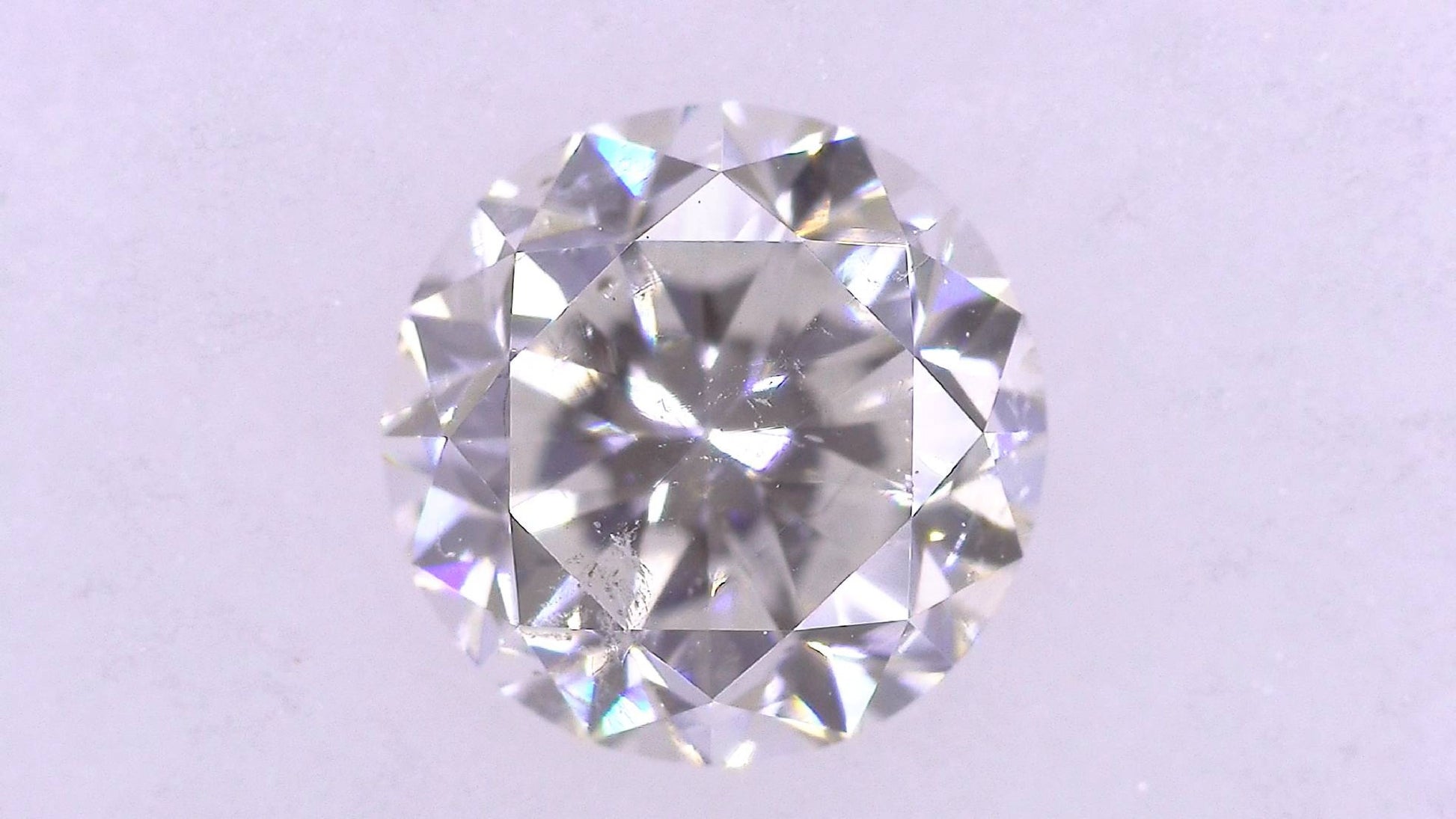 0.615ct F SI-2 POOR/GD/FR MEDIUM BLUE NATURAL 5.15-5.20X3.44mm Loose Diamond