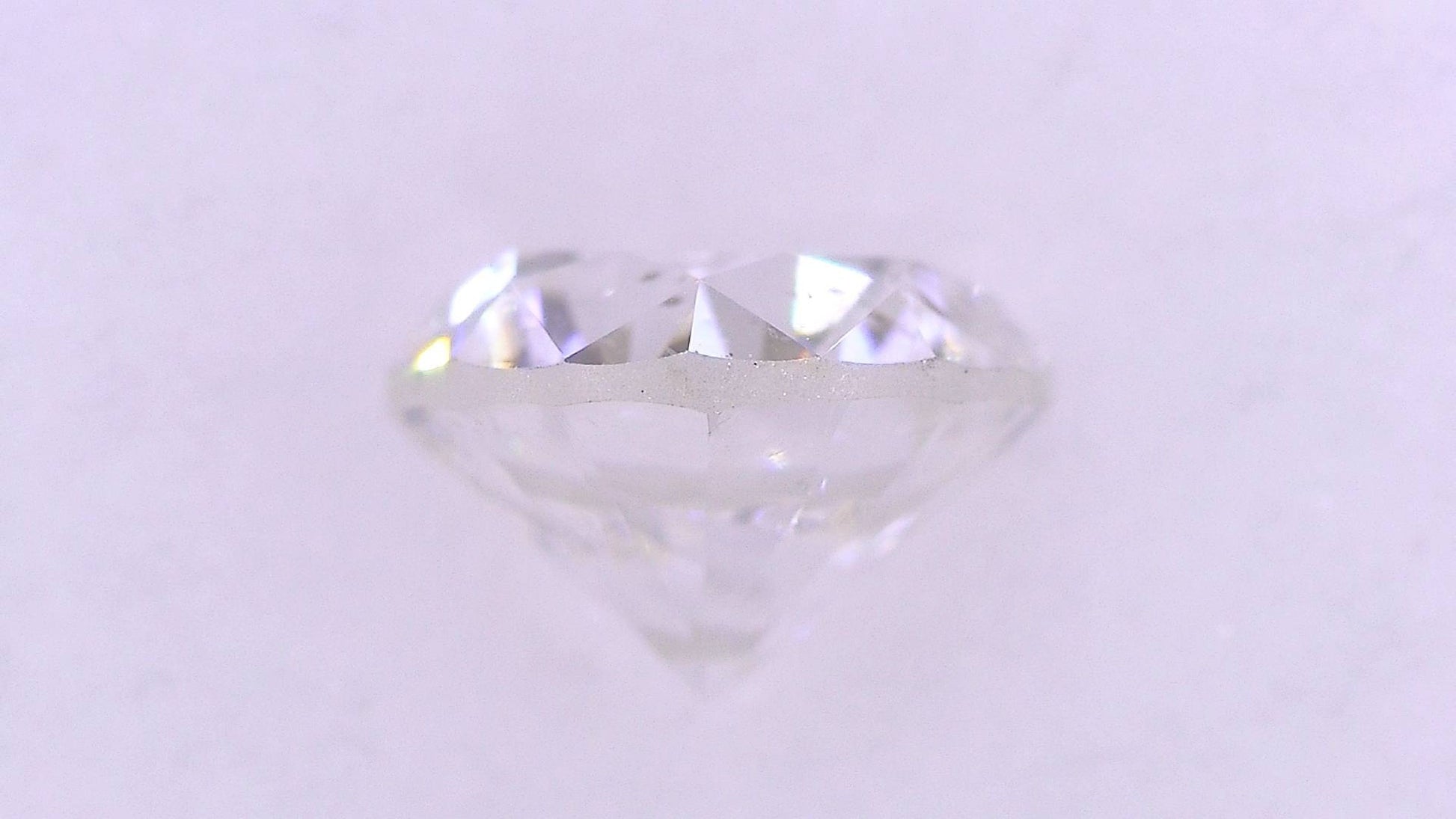 0.615ct F SI-2 POOR/GD/FR MEDIUM BLUE NATURAL 5.15-5.20X3.44mm Loose Diamond