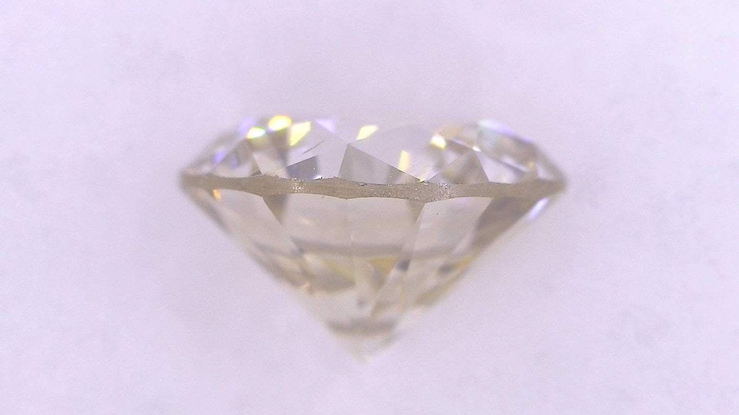 0.815ct UNDER N) VERY LIGHT BROWN VS-2 VERY GOOD/GD/GD MEDIUM BLUE NATURAL 5.87-5.94X3.72mm Loose Diamond