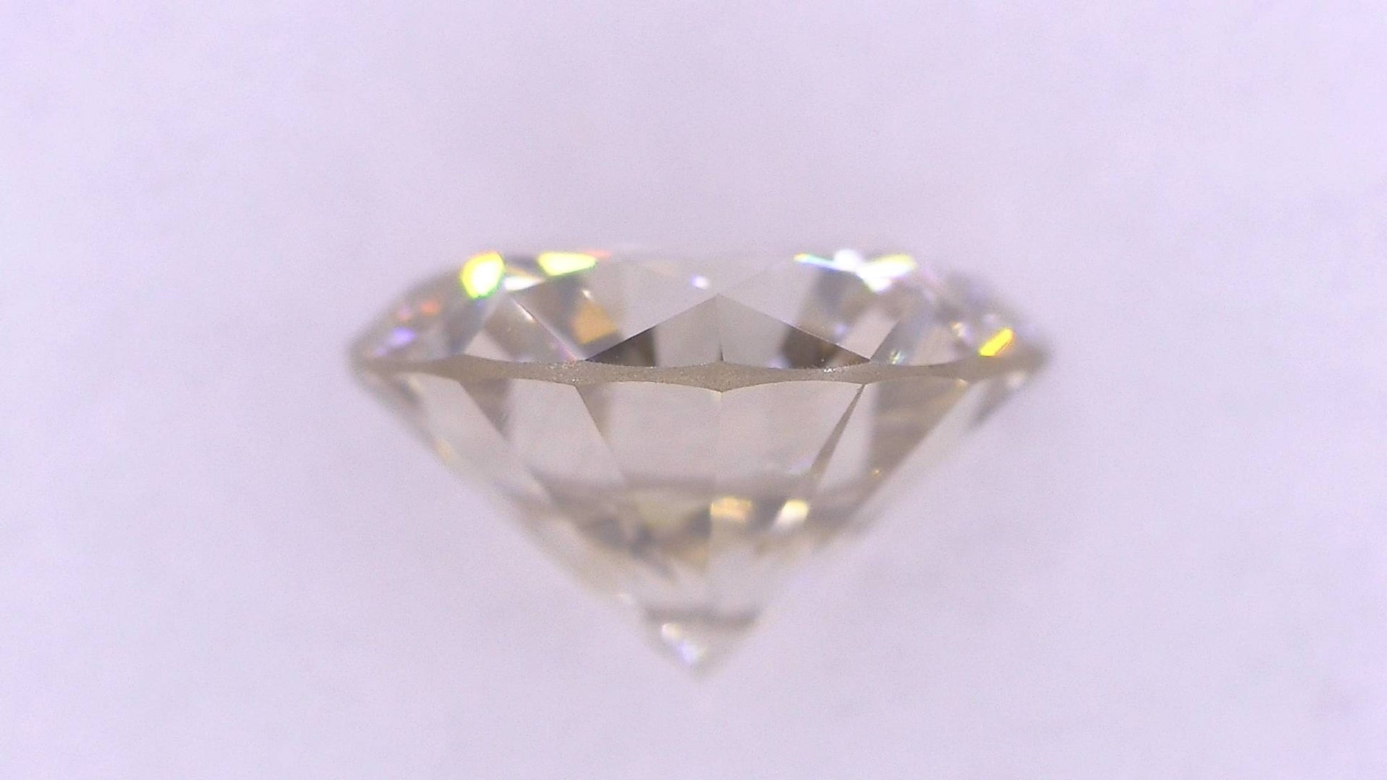 0.631ct UNDER S) LIGHT BROWN VS-1 VERY GOOD/GD/GD STRONG BLUE NATURAL 5.48-5.56X3.36mm Loose Diamond