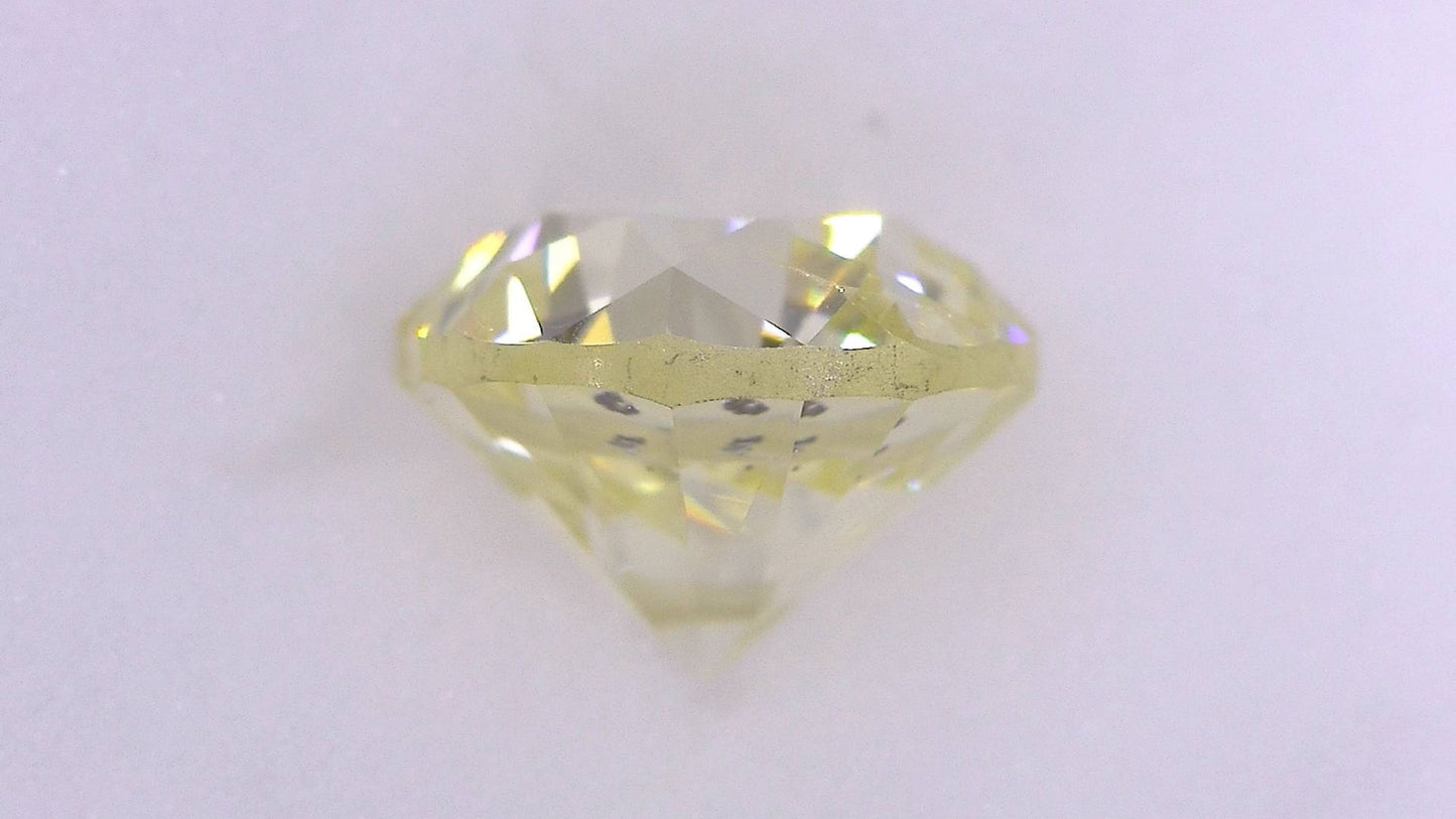 1.022ct UNDER S) LIGHT YELLOW SI-2 POOR/GOLD/FR FAINT NATURAL 5.80-6.06X4.31mm Loose Diamond