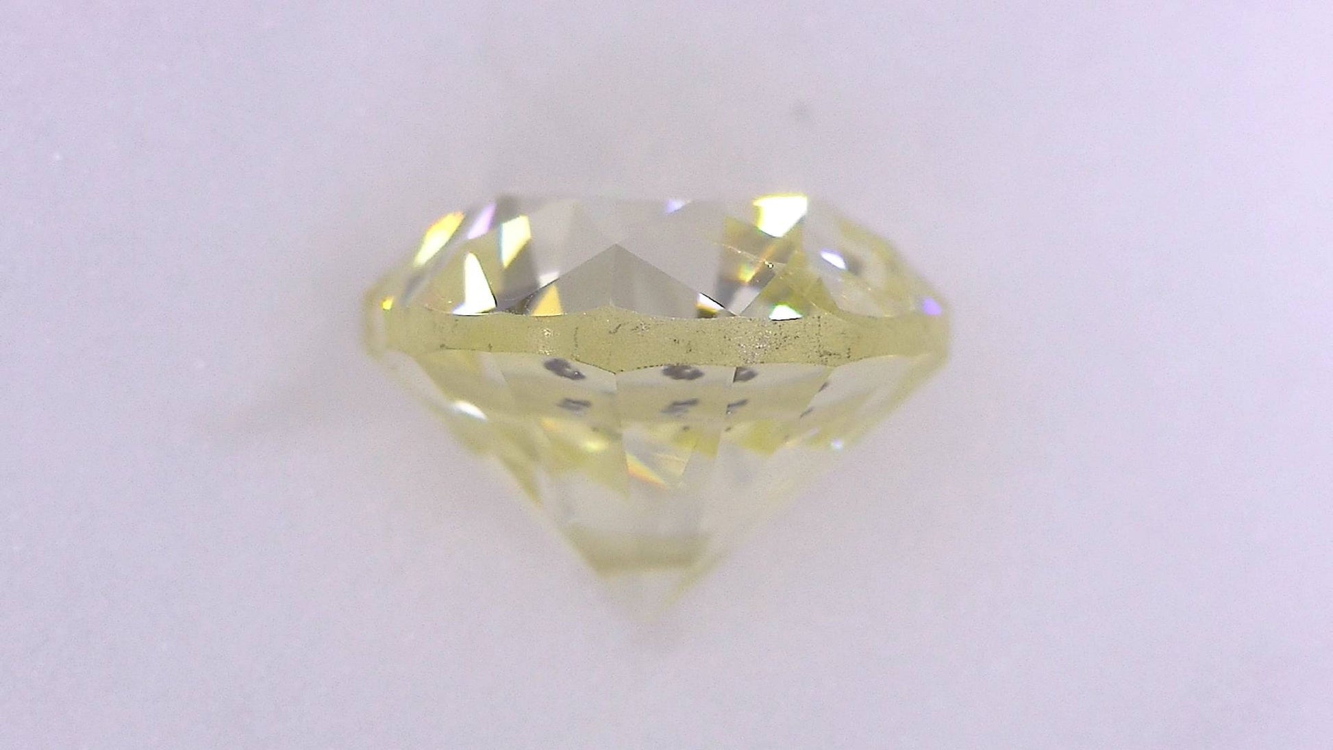 1.022ct UNDER S) LIGHT YELLOW SI-2 POOR/GOLD/FR FAINT NATURAL 5.80-6.06X4.31mm Loose Diamond