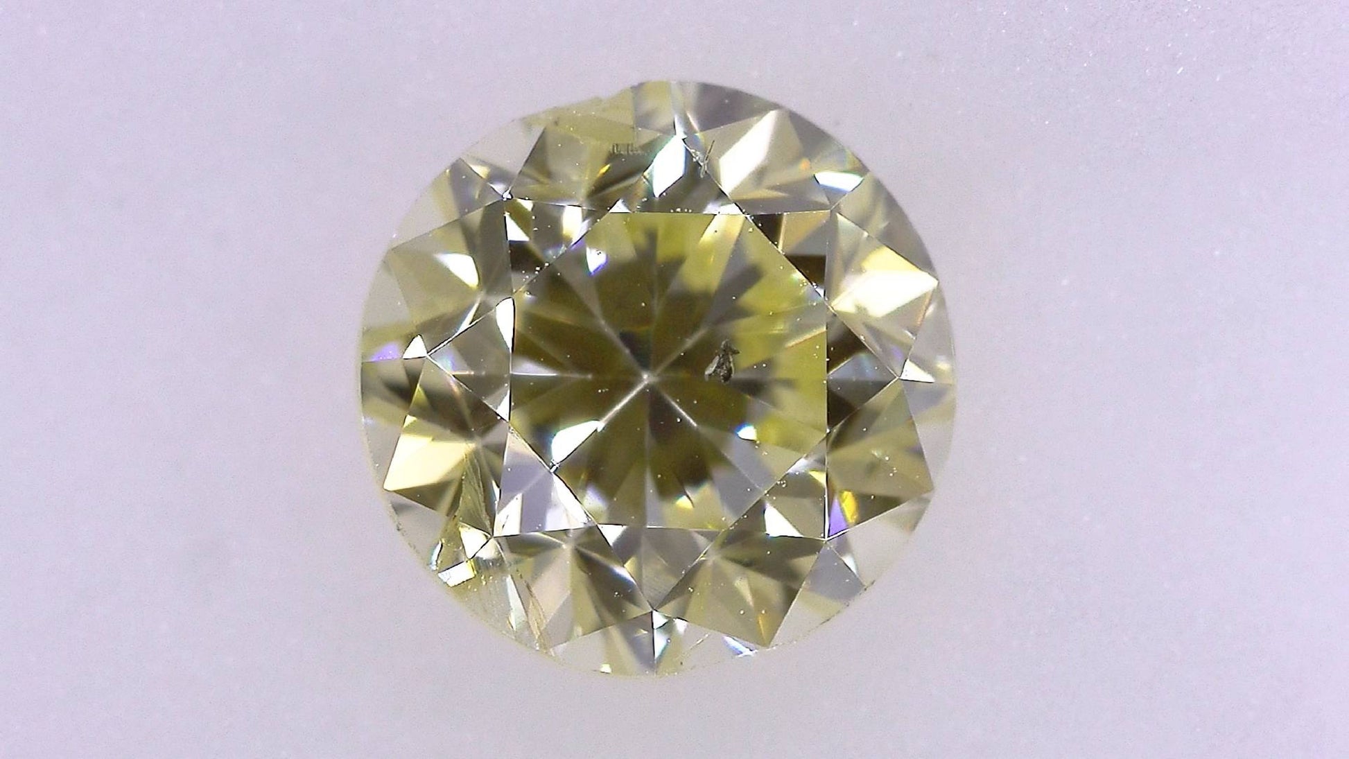 1.022ct UNDER S) LIGHT YELLOW SI-2 POOR/GOLD/FR FAINT NATURAL 5.80-6.06X4.31mm Loose Diamond