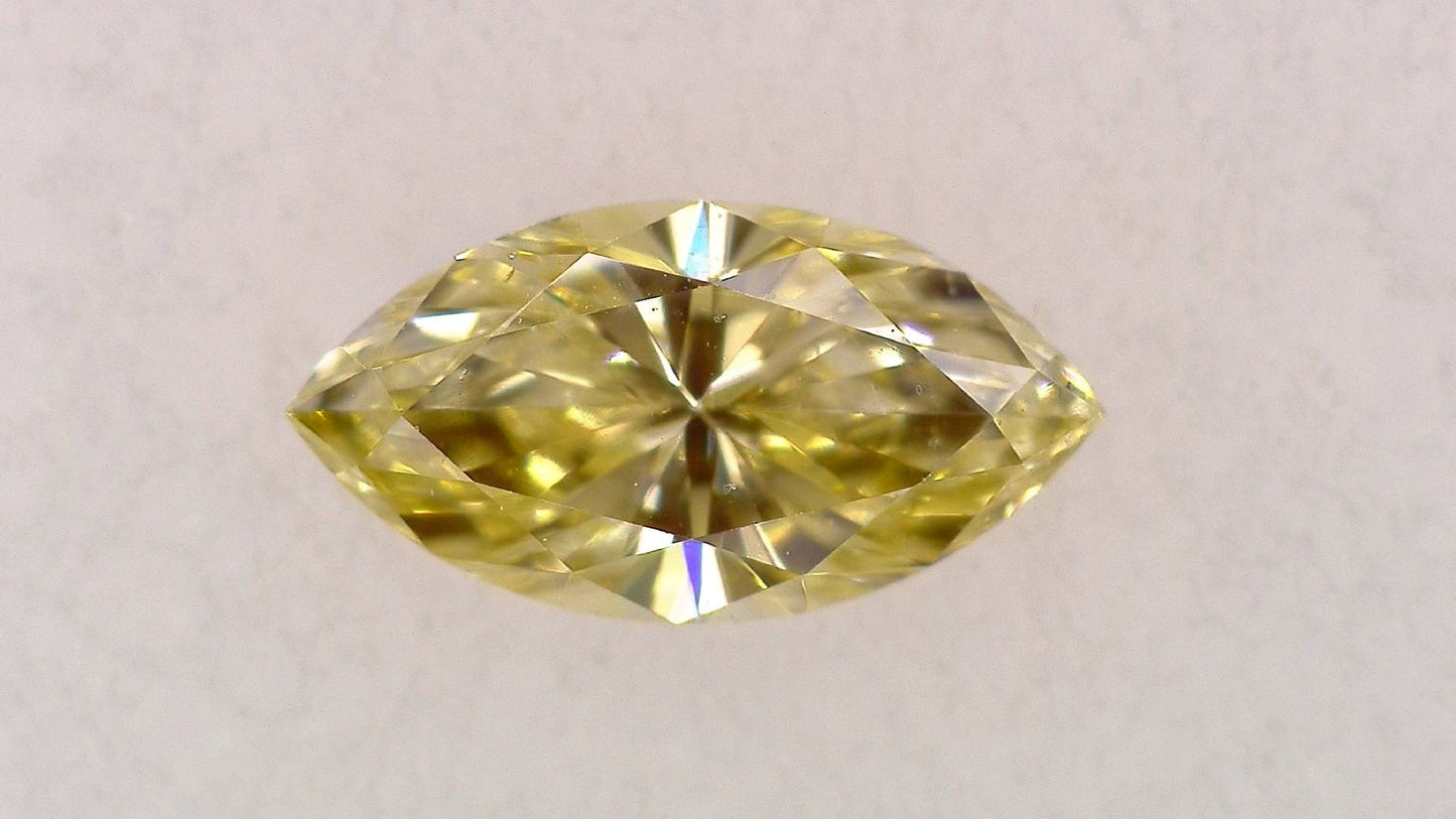 0.107ct Fancy Light Yellow VS-2 ****/GD/GD Strong Yellow Natural 4.59-2.38X1.62mm MQ Diamond Loose