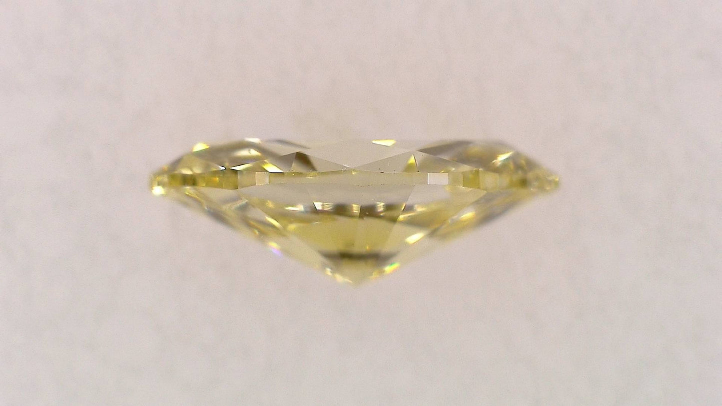 0.107ct Fancy Light Yellow VS-2 ****/GD/GD Strong Yellow Natural 4.59-2.38X1.62mm MQ Diamond Loose