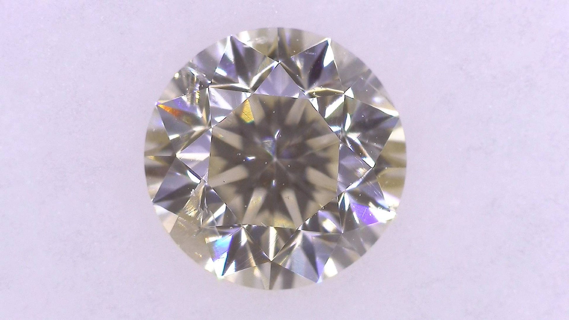 0.682ct M ) FAINT BROWN I-1 FAIR/GD/GD MEDIUM BLUE NATURAL 5.38-5.44X3.70mm Loose Diamond