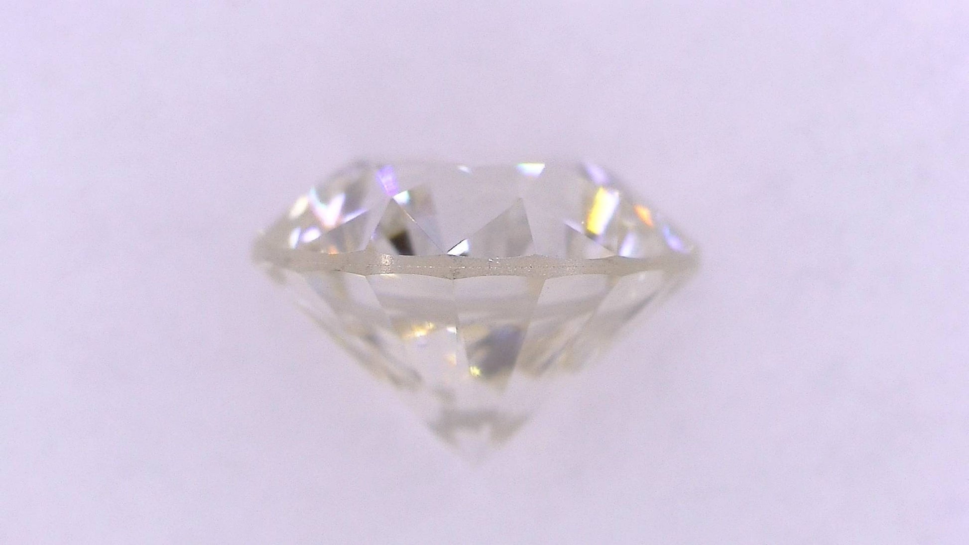 0.682ct M ) FAINT BROWN I-1 FAIR/GD/GD MEDIUM BLUE NATURAL 5.38-5.44X3.70mm Loose Diamond