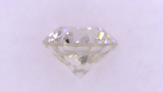 0.682ct M ) FAINT BROWN I-1 FAIR/GD/GD MEDIUM BLUE NATURAL 5.38-5.44X3.70mm Loose Diamond
