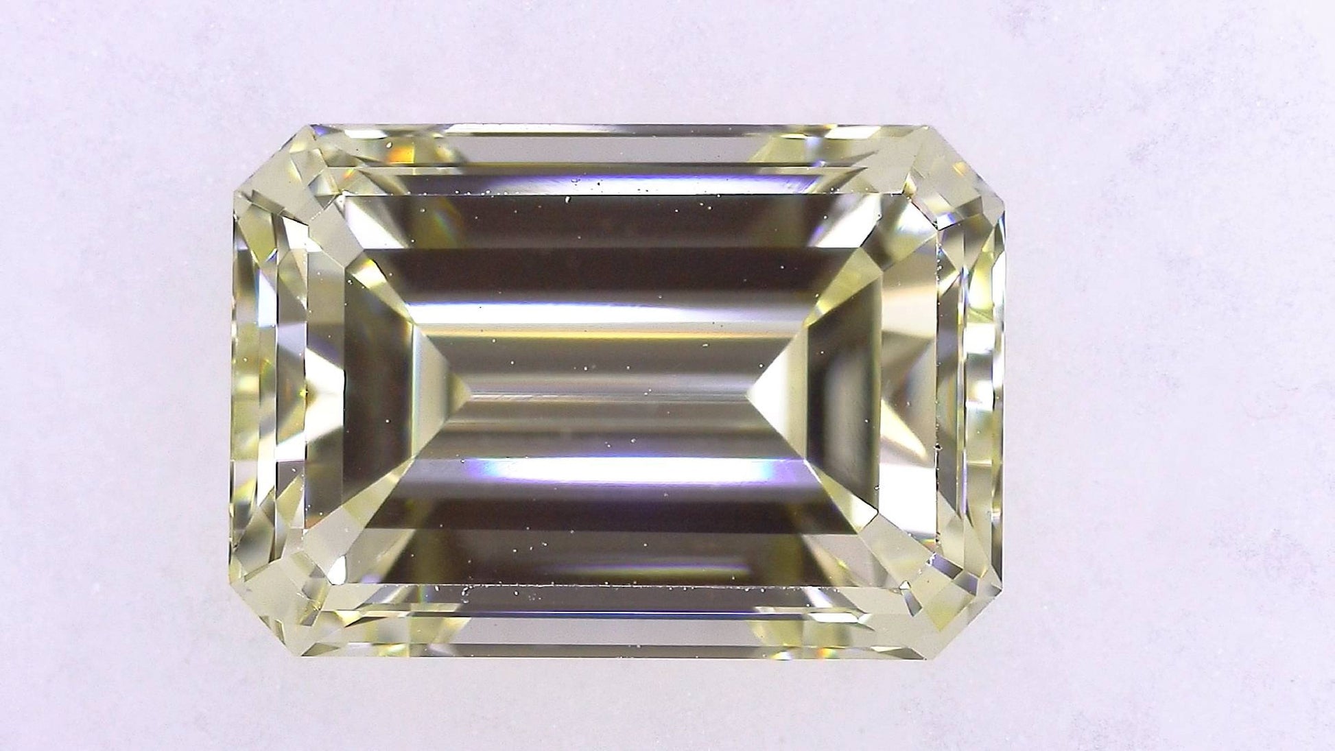 1.504ct UNDER N)VERY LIGHT YELLOW VS-1 ****/GD/GD STRONG BLUE NATURAL 7.87-5.45X3.62mm EM Diamond Loose
