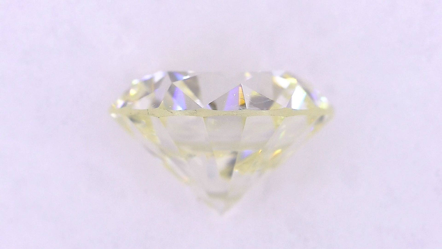 1.007ct UNDER N)VERY LIGHT YELLOW SI-2 GOOD/GD/VG MEDIUM BLUE NATURAL 6.30-6.34X4.03mm Loose Diamond
