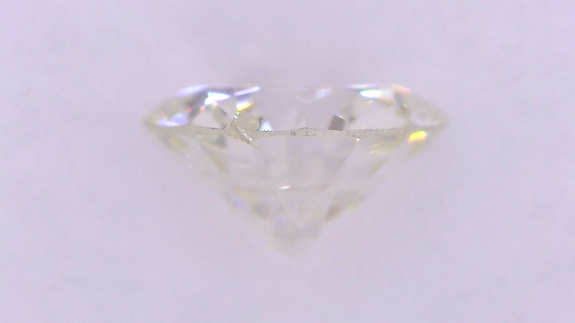0.496ct K SI-2 GOOD/GD/FR FAINT NATURAL 5.20-5.28X3.02mm Loose Diamond