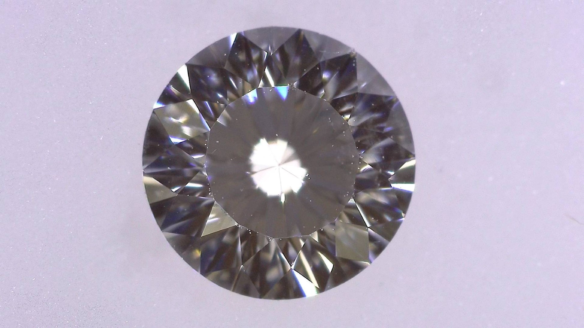 0.590ct K SI-1 ****/GD/GD MEDIUM BLUE NATURAL 5.29-5.34X3.33mm RD Loose Diamond