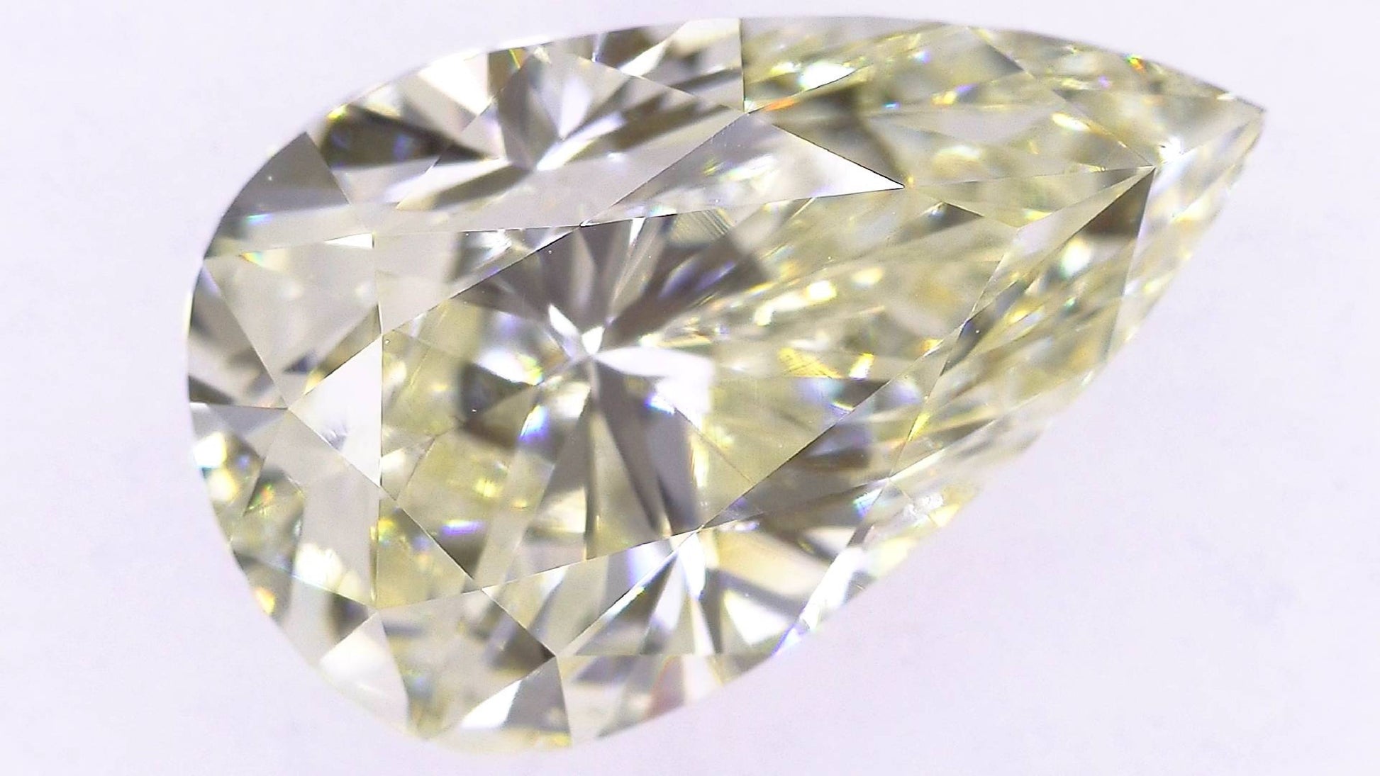 3.113ct UNDER N)VERY LIGHT YELLOW SI-1 ****/GD/GD FAINT NATURAL 12.55-7.70X5.38mm PS Loose Diamond