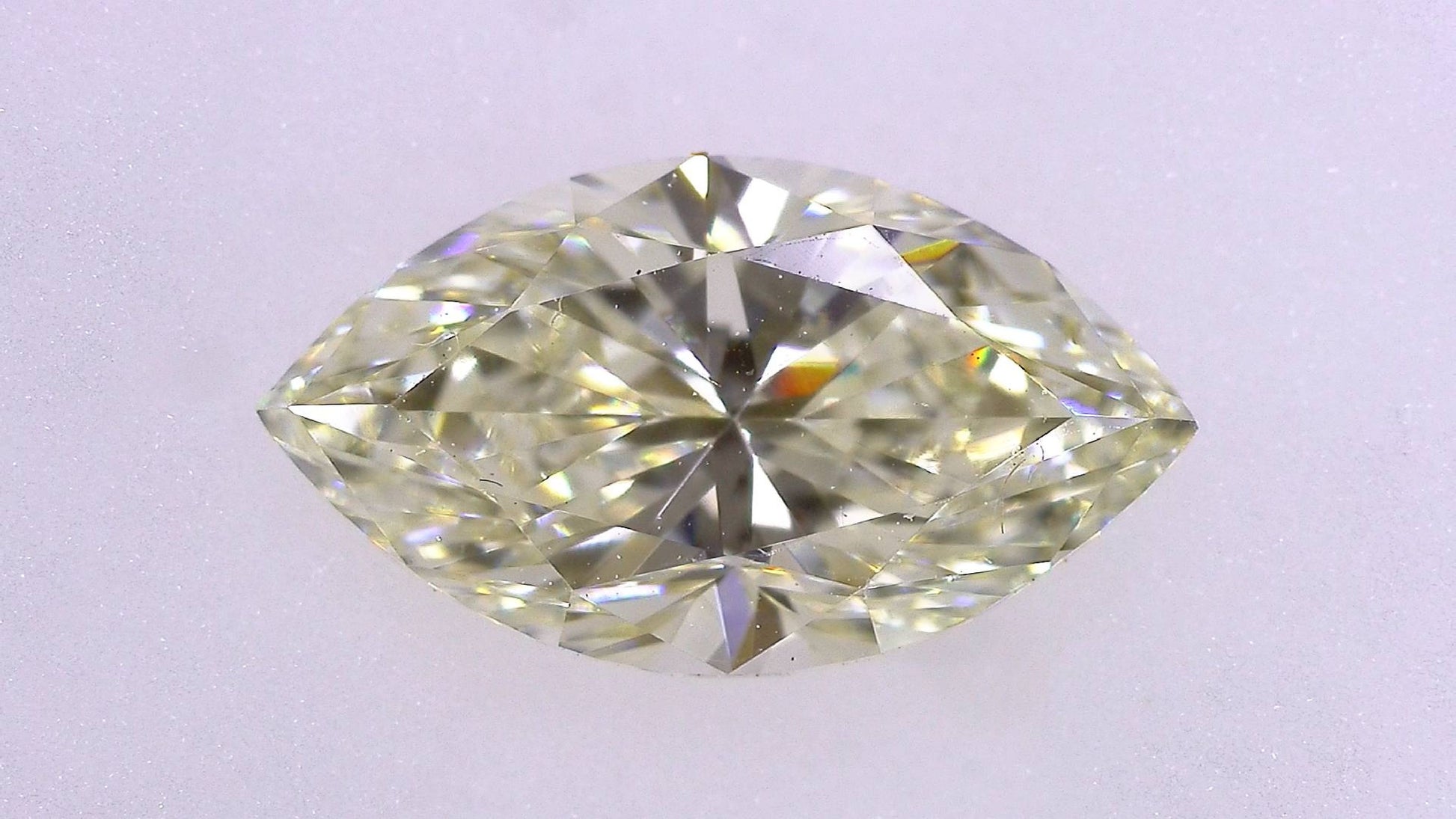 1.074ct UNDER N)VERY LIGHT YELLOW VS-1 ****/GD/GD FAINT NATURAL 9.44-5.24X3.73mm MQ Diamond Loose