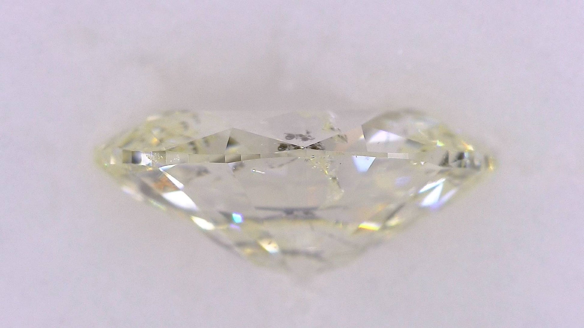 2.012ct UNDER N)VERY LIGHT YELLOW I-1 ****/GD/GD FAINT NATURAL 9.94-7.23X4.17mm OV Diamond Loose