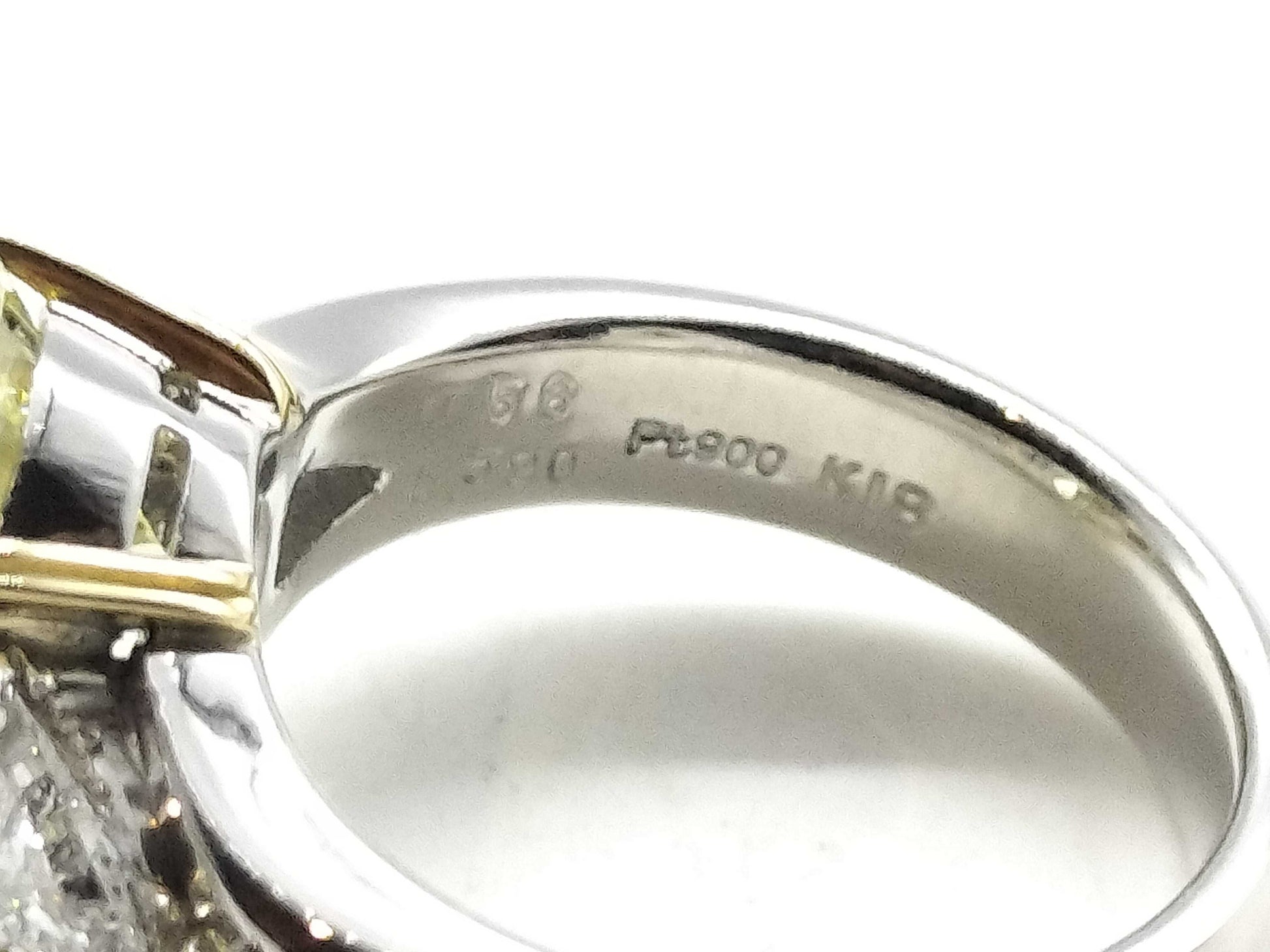 D5.590ct FD0.56ct PT900/K18 13..1g Ring 