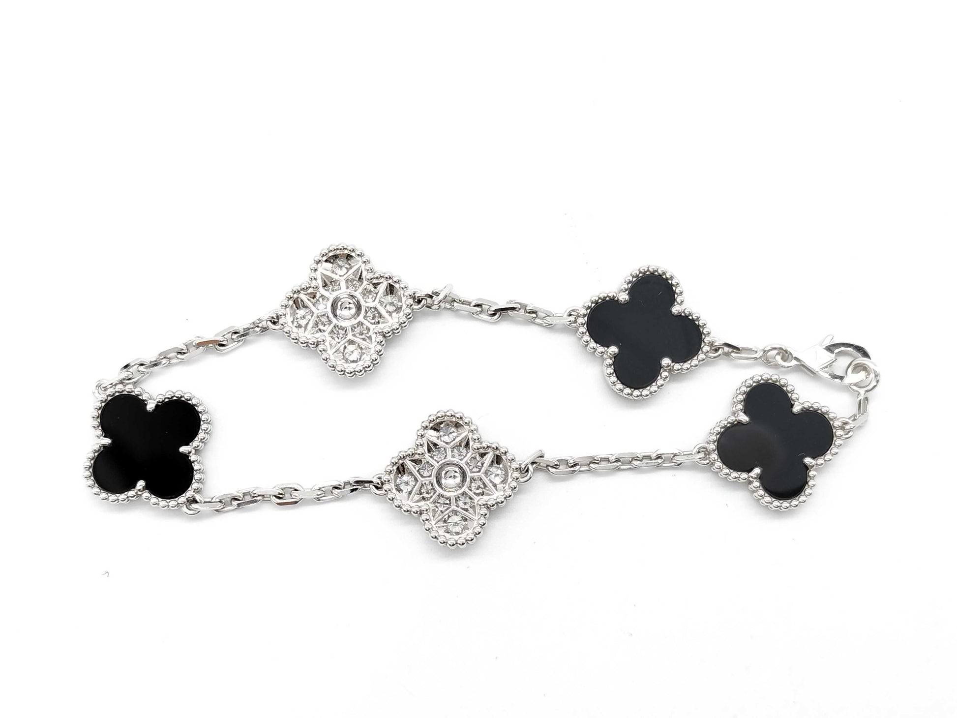 Van Cleef & Arpels Vintage Alhambra 5-Piece Onyx and Diamond Bracelet in Gold and White Gold , 12.8g