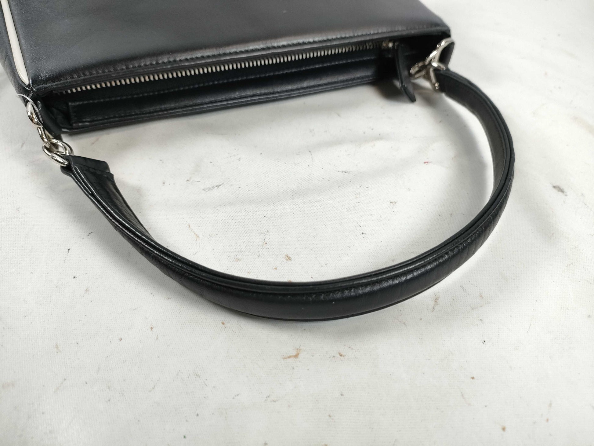 agnes b. one-shoulder leather shoulder bag