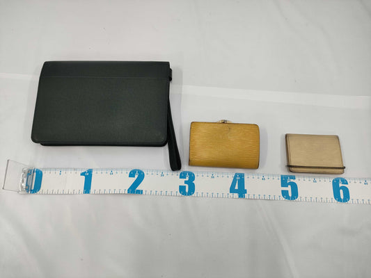 LOUIS VUITTON 11. 5 items including a Louis Vuitton clutch wallet