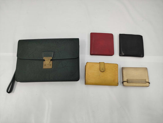 LOUIS VUITTON 11. 5 items including a Louis Vuitton clutch wallet