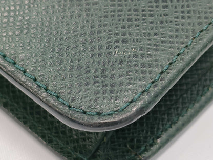 LOUIS VUITTON 11. 5 items including a Louis Vuitton clutch wallet