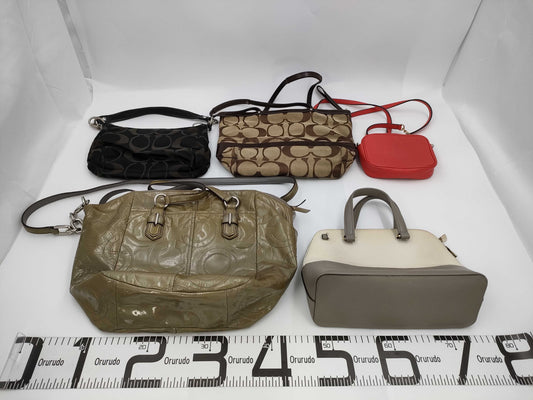 Five beautifully-fitted shoulder bags, including COACH Michael Kors.
