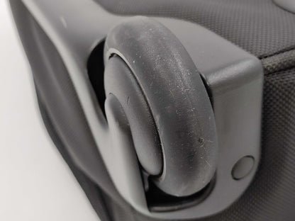 TUMI Boston bag with wheels and tag