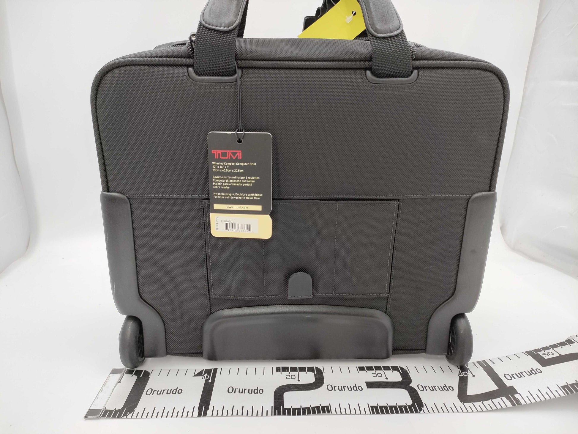 TUMI Boston bag with wheels and tag