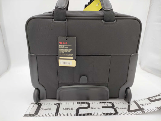 TUMI Boston bag with wheels and tag
