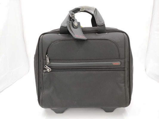 TUMI Boston bag with wheels and tag