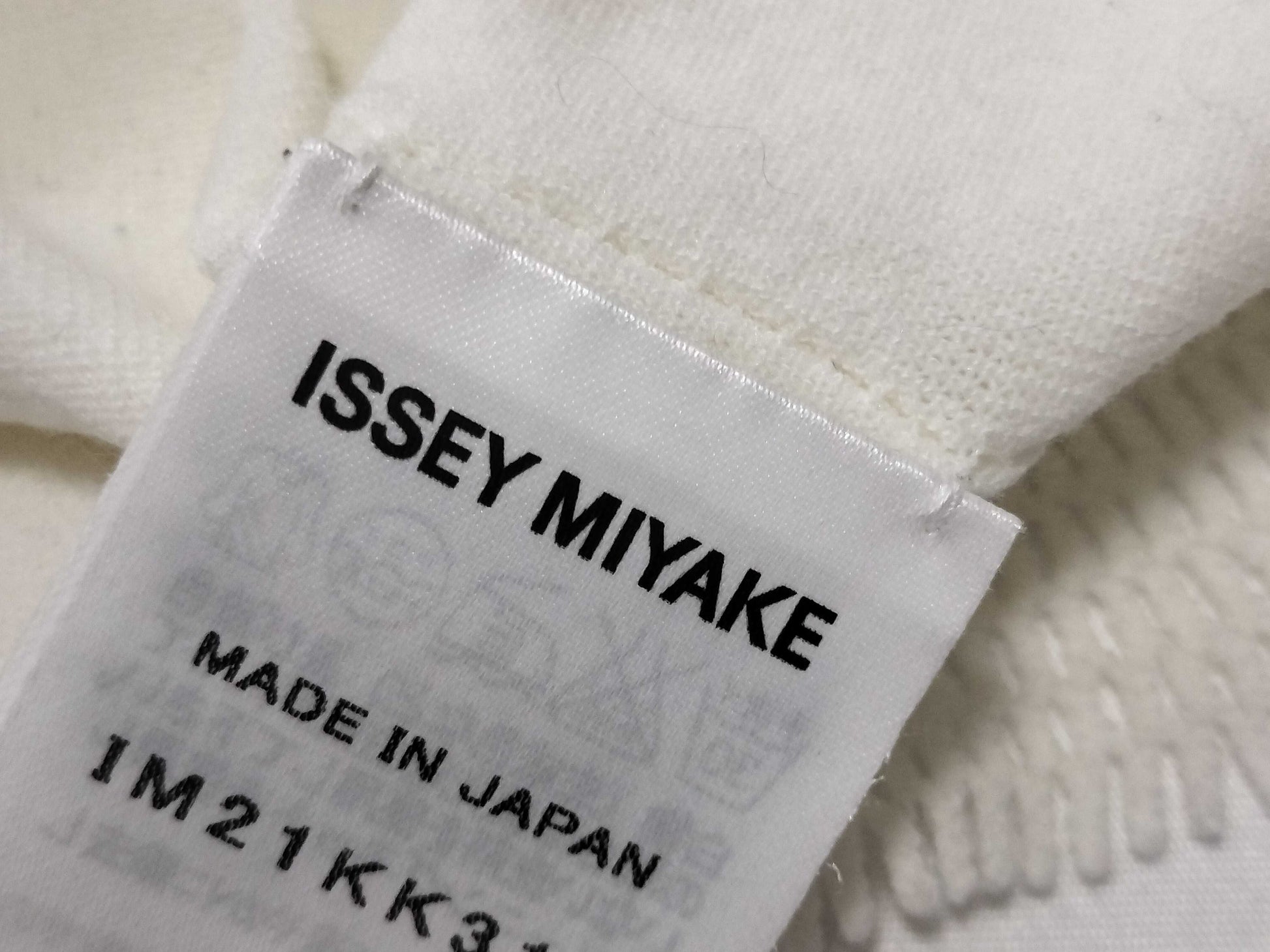 ISSEY MIYAKE Women's White Tops Tops