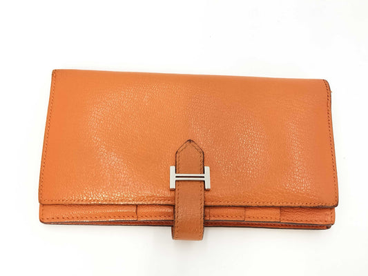 HERMES Bearn □Q engraved wallet with frayed threads in the bill compartment