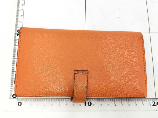 HERMES Bearn □Q engraved wallet with frayed threads in the bill compartment